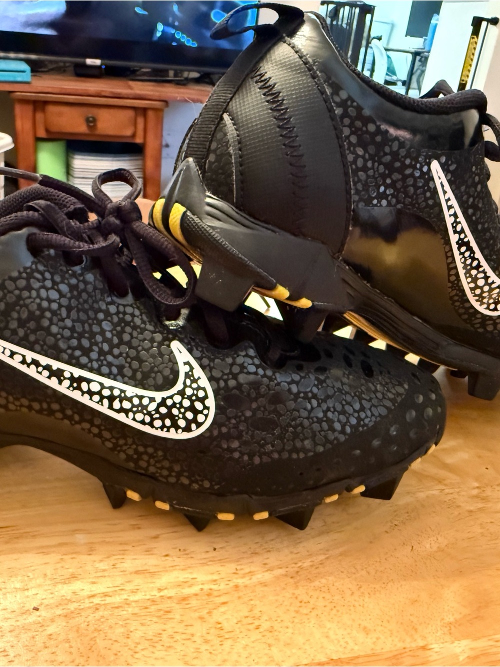 Nike Black Cleats with White Speckled Swoosh